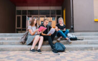 Students on stairs of university