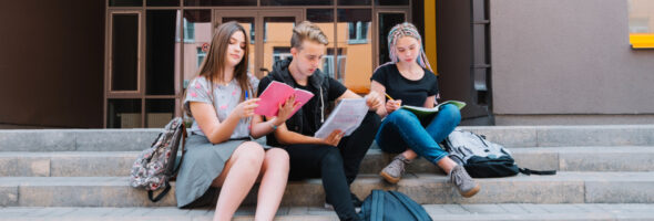 Students on stairs of university