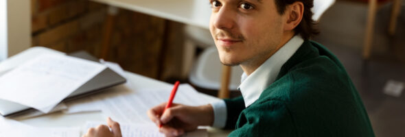 Medium Shot Man Correcting Texts